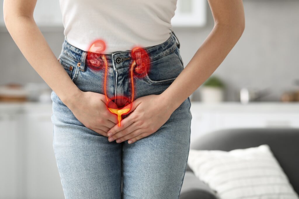 A woman consulting a doctor about urinary tract infection symptoms and treatment options.