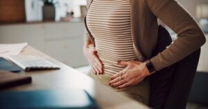 Woman consulting with a gynecologist about endometriosis pain, diagnosis, and treatment options
